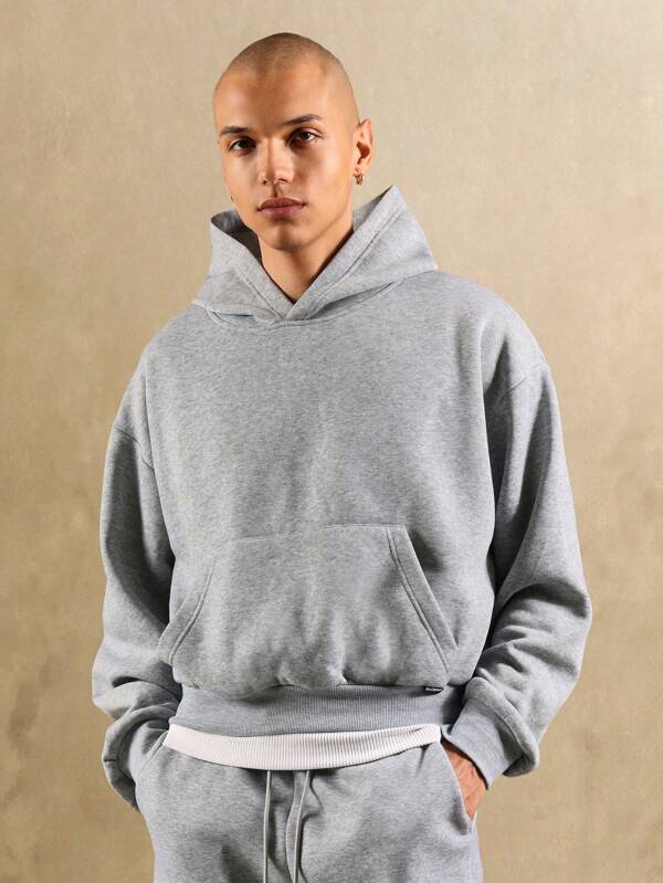 Sudadera con capucha de bolsillo central y ribete acanalado liso SUMWON
