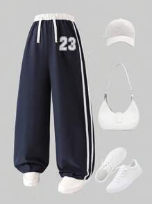SHEIN Pantaloni sport casual personalizați cu imprimeu color block pentru fete preadolescente, culori vibrante, decor grafic cu cifre, croială lejeră pentru sport și ținute casual, perfecți pentru vară