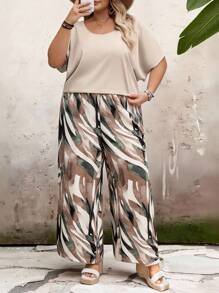 SHEIN CURVE+ Completo donna taglia curvy, top a maniche corte con collo rotondo tinta unita e pantaloni wide-leg con stampa, adatto per vacanze campestri primavera/estate, outfit per vacanze estive, spiaggia, mare - Multicolore - Visualizzare 4