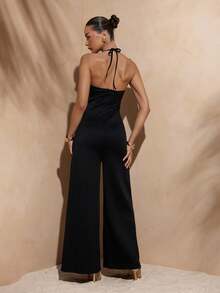 Hauture Macacão feminino de cor sólida com decote halter e decoração de flores 3D, adequado para o verão - Preto - Ver 2