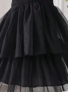 Robe de fille jeune à col rond sans manches avec couches de maille de luxe, robe épaisse et élaborée noire de style gâteau, été