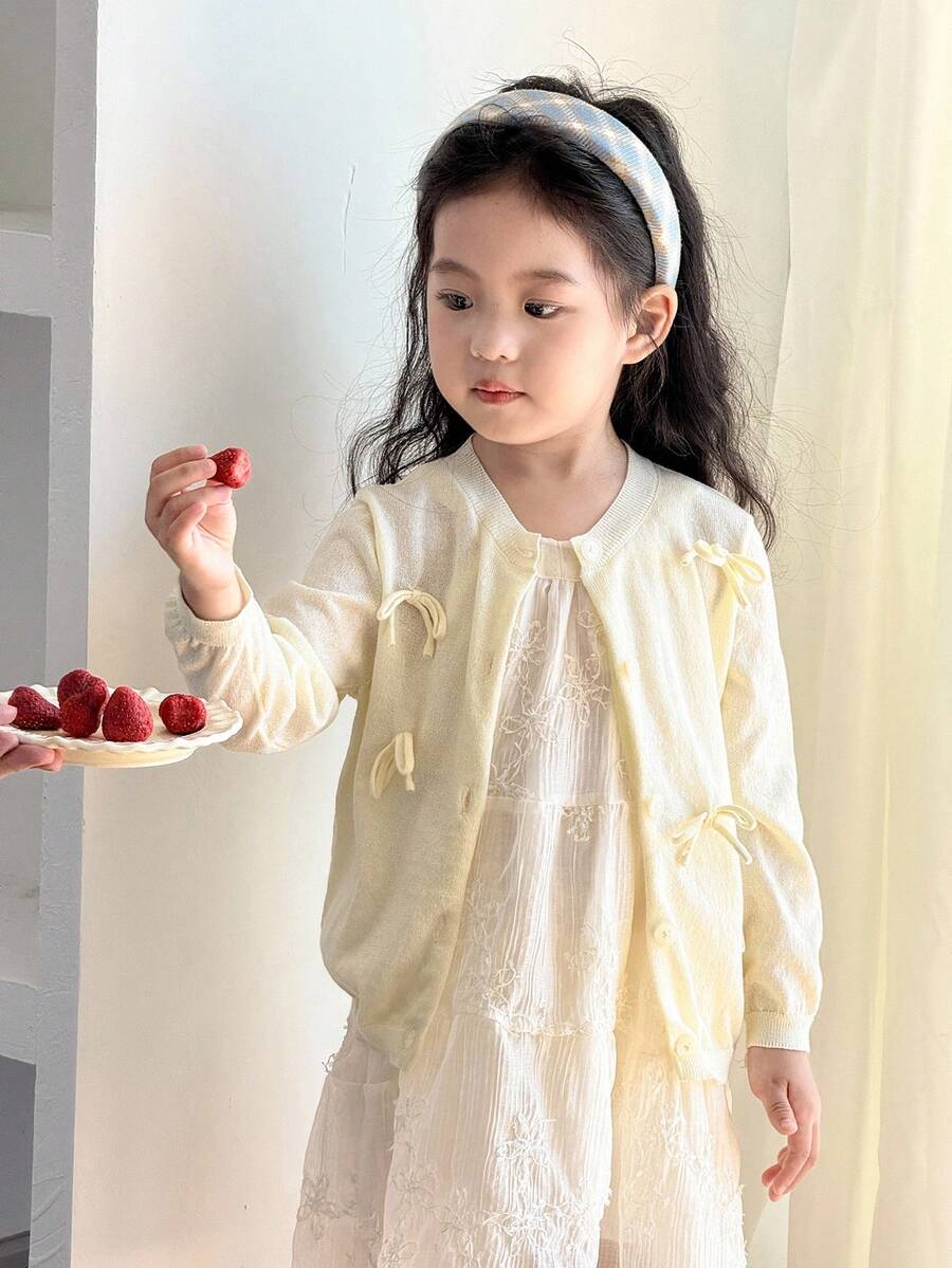 SHEIN Little Byeori كارديجان كنزة صوفية كاجوال بفيونكة للفتيات الصغيرات، ملابس علوية مدرسي جميل، كارديجان ربيعي مطبوع، كارديجان مصنوع من الصوف بلون أحادي، مناسب للخريف والشتاء - أصفر - مشاهدة 1