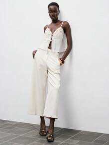 Lumivelle Women's Apricot Spaghetti Strap Bralette Cami Top Featuring An Alluring Knot Front And Elegant Embroidered Details. This Regular Length, Top Is Ideal For Stylish Party Wear. Clothes For University - Apricot - View 7