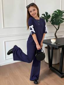 Set de 2 piezas de niña preadolescente: Camiseta de manga corta suelta con lazo decorativo y pantalones acampanados, versátil y casual, adecuado para el verano y el regreso a la escuela - Negro - Ver 9