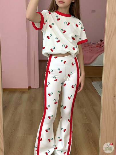 SHEIN Conjunto de 2 piezas informal y minimalista con estilo vintage estadounidense para niñas preadolescentes, con estampado de lunares y cerezas, ribete rojo, blusa de manga corta y pantalón largo, adecuado para ropa de verano, uniforme escolar y ropa para niñas