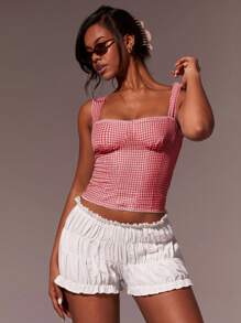 Athîral Top camiseta ajustada y corta a cuadros para mujer