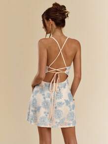 SHEIN BAE فستان قصير جداً من نسيج محبوك لمرأة، ذو ربطة عنق منخفضة الظهر وقصة مزهرة، نسيج محبوك ذو ملمس ملون بالأزرق اللون