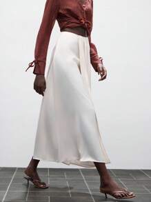 Lumivelle Satin Gloss Wear Women's Elegant Low Waist Satin Glossy Fabric A-Line Pleated Slit Flowy Skirt Looks Of Party Clothes For University - Apricot - View 5