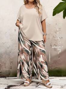 SHEIN CURVE+ Completo donna taglia curvy, top a maniche corte con collo rotondo tinta unita e pantaloni wide-leg con stampa, adatto per vacanze campestri primavera/estate, outfit per vacanze estive, spiaggia, mare - Multicolore - Visualizzare 6