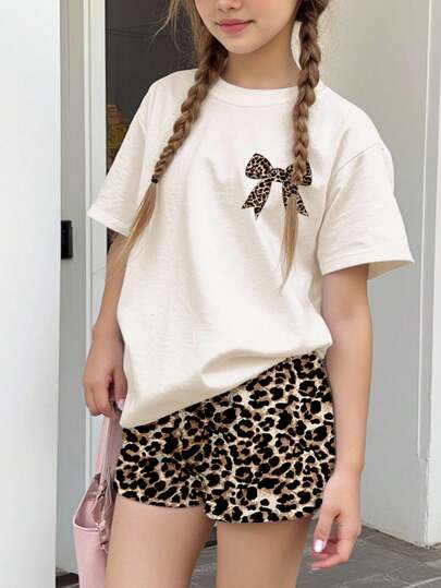 SHEIN Leap Crew 2pcs Cream Beige Vintage Leopard Print Bow Decor Casual Minimalist Crew Neck Short Sleeve T-Shirt And Shorts Set, Suitable For Spring/Summer, Teen Girls Girls Cheetah Print Shorts Girls Bow Print Tshirt Girls Leopard Print Shorts Leopard Bow Tshirt Cheetah Print Top Girls