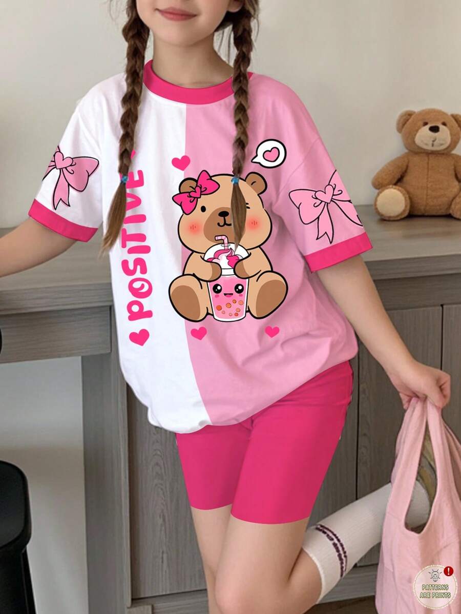 SHEIN Leap Crew 2 件套青少年女孩休闲可爱卡通水豚、蝴蝶结、草莓色拼布短袖宽松 T 恤和紧身裤夏季服装,适合青少年女孩服装、返校服装 - 彩色 - 查看 1