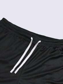 Manfinity Sport Corelite Pantalones cortos deportivos sueltos de doble capa con cordón en la cintura y estampado de letras para hombres
