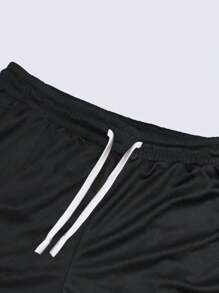 Manfinity Sport Corelite Pantalones cortos deportivos con estampado de rayas y letras en contraste para hombre