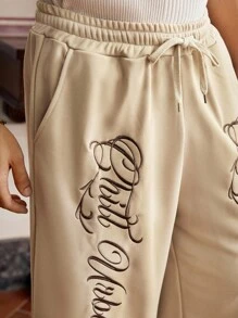 SWAVVY 男士休闲街头时尚字母刺绣抽绳腰侧口袋宽松阔腿运动裤 - 杏色 - 查看 4