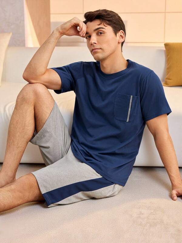 Manfinity Underwear&Sleepwear Basics Herren Pyjama Set mit Tasche vorn auf dem T-Shirt und Shorts