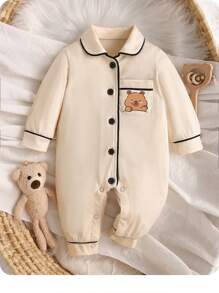 SHEIN Cozy Newborn Baby Apricot Polyester Long Sleeve Pajama. This Collared Button-Front Romper Features An Adorable Cartoon Bear Pocket, Perfect For Infant Everyday Comfort.