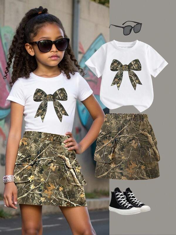 Tween Girl Casual Minimalist Bow Decor Short Sleeve Round Neck T-Shirt Paired With Mini Skirt, Suitable For Summer Girls Camo Skirt Sets Camo Outfits For Girls Kids Camo Skirt Set