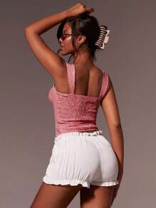 Athîral Top camiseta ajustada y corta a cuadros para mujer