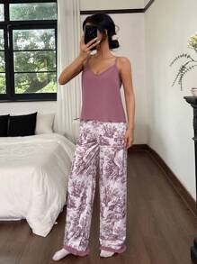 SHEIN Set de ropa de dormir para mujer de 2 piezas - Top de camiseta de unicolor y pantalones largos estampados
