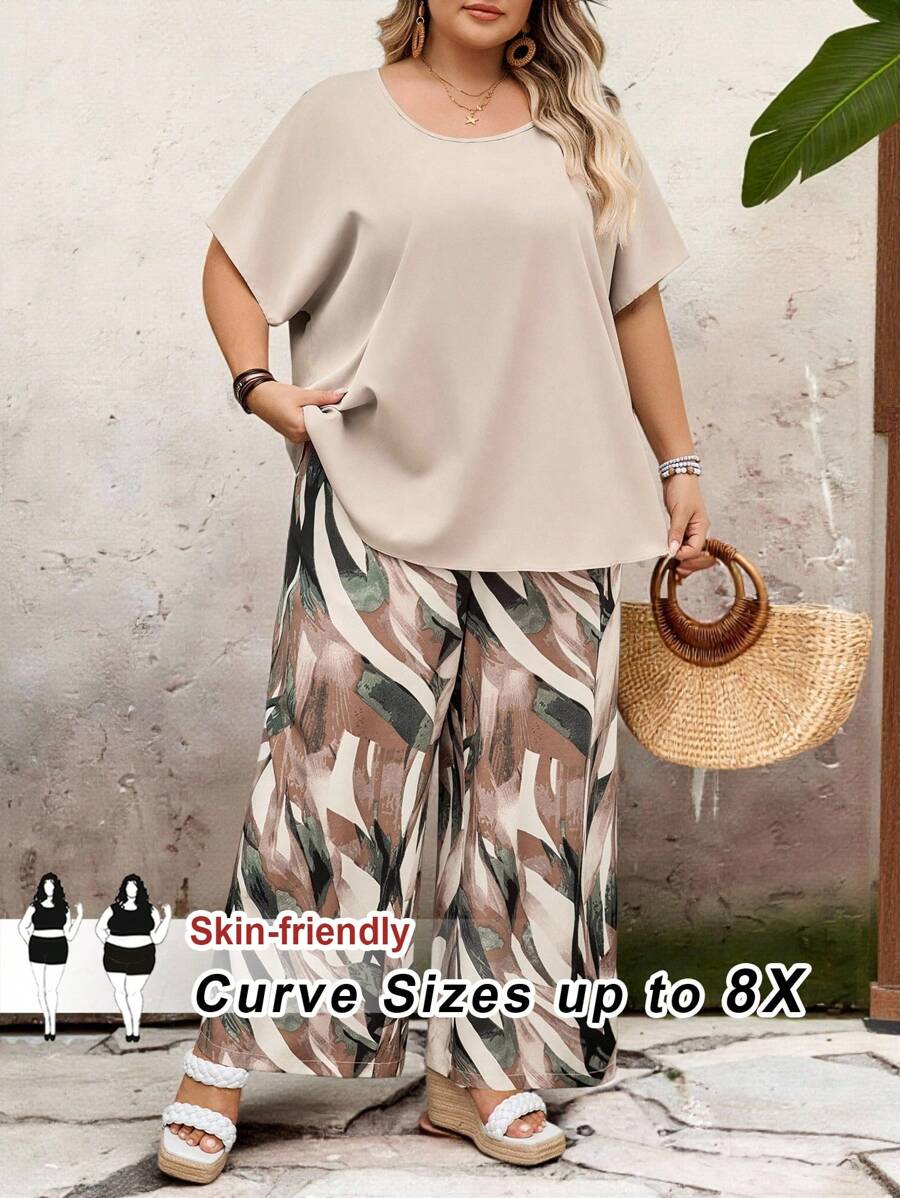 SHEIN CURVE+ Completo donna taglia curvy, top a maniche corte con collo rotondo tinta unita e pantaloni wide-leg con stampa, adatto per vacanze campestri primavera/estate, outfit per vacanze estive, spiaggia, mare - Multicolore - Visualizzare 1