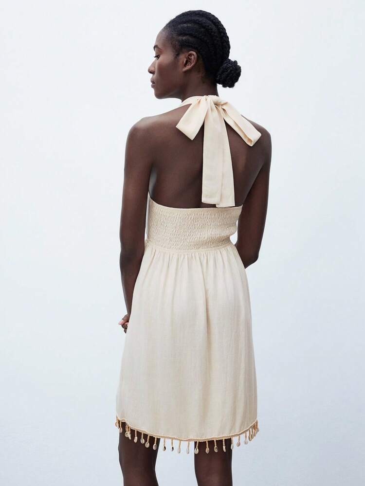 SHEIN Maija Women's Light Apricot Fringed Hem Summer Dress, Versatile, Elegant Casual Urban Fashionable Design, Comfortable Fitted Neck-Tie Back Twist Knot Ruched Hem Fringed Splice Beach Vacation Style Mini Dress All-Match Summer Clothing For All Seasons, Modern Holiday Fashion Design, Comfortable Beach Beach Clothing, Bohemian Style, Isabi Island Holiday Wear, Summer Dopamine Holiday Wear, Ins Same Style Holiday Style, Exotic Atmosphere, Country Concert, Western Style Clothing