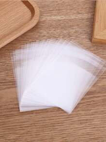 SHEIN 100 pièces Sacs à biscuits autoadhésifs mats, emballage en plastique transparent épais pour madeleines, biscuits, pâtisseries, collations - refermables, hermétiques, durables, sacs en vrac pour boulangerie, desserts, cadeaux de fête, sans accessoires inclus