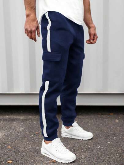 SHEIN Tonårspojkar, casual, randiga marinblå och svarta joggingbyxor med vävda fickor, lämpliga för höst, vinter, skola, hem, vardag, sport, födelsedagsfest, utflykt, mångsidigt termofodrat för alla matchande tillfällen.