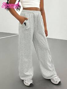 SHEIN Explorewe Dziewczęce (duże) spodnie dresowe dla nastolatek, swobodne, minimalistyczne, kontrastowe, z kieszeniami i wzorem z logo, luźne, szerokie nogawki, długie spodnie dresowe