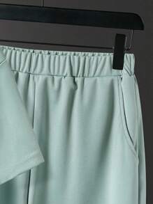 Vacaura 2 piezas Outfit casual para adolescentes varones, camiseta de cuello redondo con gráfico inglés con estampado de moda y estilo con diseño lateral curvo, pantalones cortos con etiqueta simple y bajo curvilíneo, adecuado para verano y otoño - Verde - Ver 3