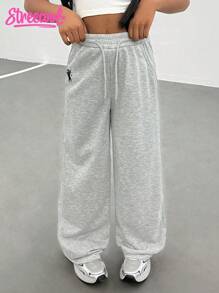 SHEIN Explorewe Dziewczęce (duże) spodnie dresowe dla nastolatek, swobodne, minimalistyczne, kontrastowe, z kieszeniami i wzorem z logo, luźne, szerokie nogawki, długie spodnie dresowe