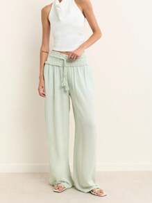 Nöista 浅绿色夏季阔腿裤，高腰褶饰，荷叶边。轻盈飘逸，适合温暖天气，是夏季装扮、旅行日或轻松惬意的7月4日造型的完美之选。
