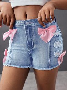 SHEIN Pantaloni scurți din denim cu model casual, stil stradă, în culori contrastante, cu funde, model uzat și margini brute, pentru fete preadolescente