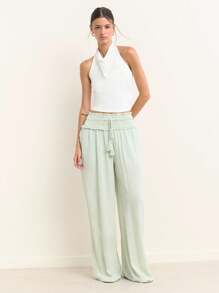 Nöista 浅绿色夏季阔腿裤，高腰褶饰，荷叶边。轻盈飘逸，适合温暖天气，是夏季装扮、旅行日或轻松惬意的7月4日造型的完美之选。