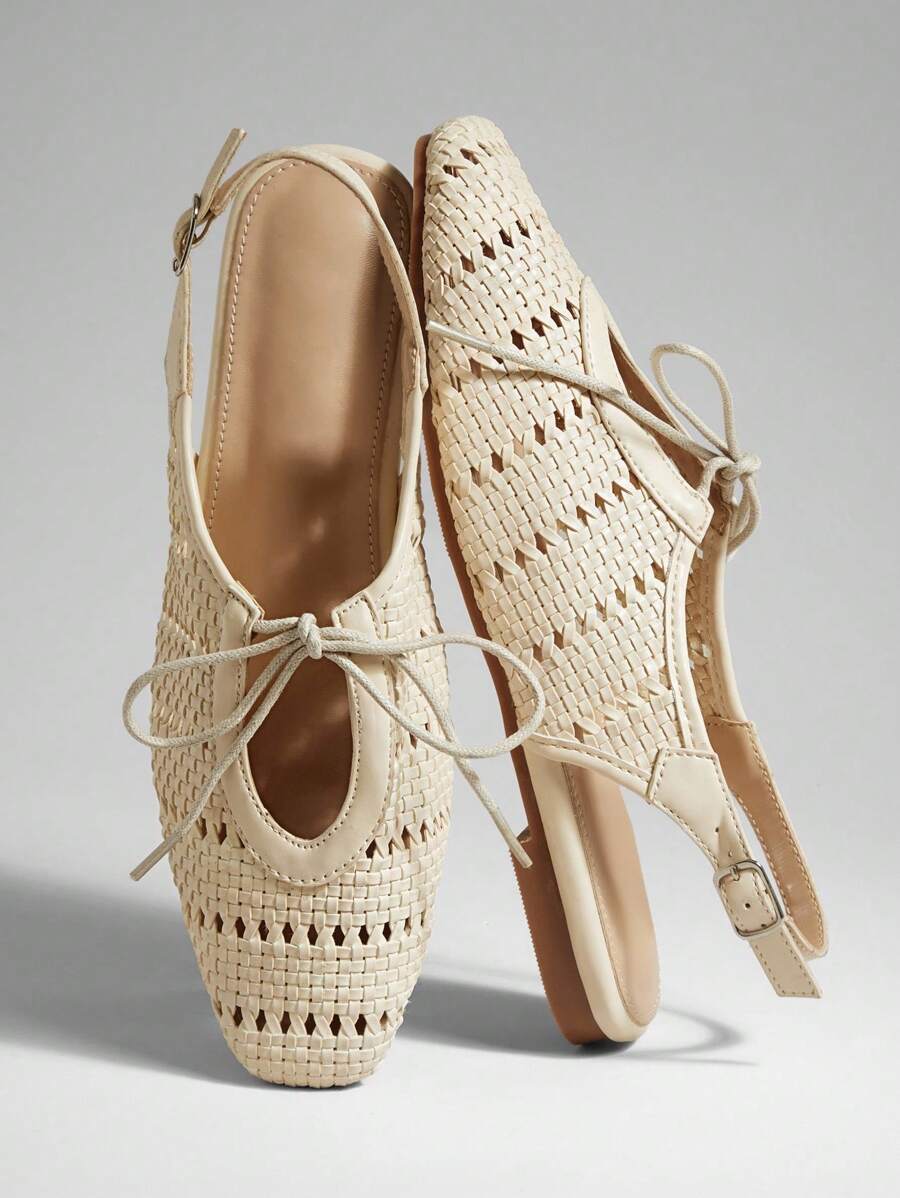 Solezae 夏季度假休闲纯色镂空平底鞋