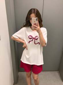 Set da due pezzi per ragazze pre-adolescenti, composto da top a maniche corte con stampa a fiocco in jacquard avorio e pantaloncini a righe in maglia, adatto per il ritorno a scuola - Multicolore - Visualizzare 1
