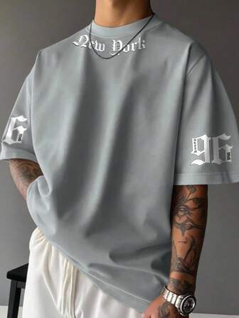 Manfinity EMRG Herren Rundhals Lässig Vielseitig Kurzarm T-Shirt mit Buchstaben Aufdruck