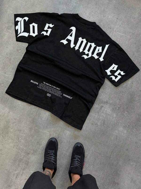 Manfinity Streetrush Camiseta de manga corta versátil con cuello redondo y estampado de letras para hombre