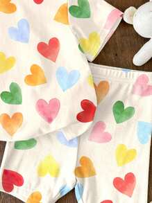 SHEIN Bộ 2 món/Bộ áo thun tay ngắn và quần short in hình trái tim nhiều màu sắc màu trắng kem dễ thương cho bé gái, kỳ nghỉ hè, cảm giác nghỉ dưỡng, họa tiết hoa cổ điển, màu pastel hoàng hôn, thư giãn - Nhiều màu - Xem 6