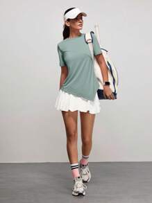 SHEIN Sports Damen T-Shirt mit einfarbigem rundem Kragen, kurzen Ärmeln und asymmetrischem Saum für den Outdoor-Bereich