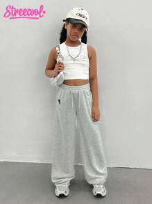 SHEIN Explorewe Dziewczęce (duże) spodnie dresowe dla nastolatek, swobodne, minimalistyczne, kontrastowe, z kieszeniami i wzorem z logo, luźne, szerokie nogawki, długie spodnie dresowe