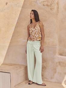 Nöista 浅绿色夏季阔腿裤，高腰褶饰，荷叶边。轻盈飘逸，适合温暖天气，是夏季装扮、旅行日或轻松惬意的7月4日造型的完美之选。