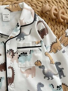 2 piezas/Set Pijama casual suelto de punto cómodo para bebé niño, con camisa de manga larga con bolsillo, cuello con solapa y pantalón recto con estampado de dinosaurio de dibujos animados