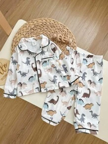 2 piezas/Set Pijama casual suelto de punto cómodo para bebé niño, con camisa de manga larga con bolsillo, cuello con solapa y pantalón recto con estampado de dinosaurio de dibujos animados