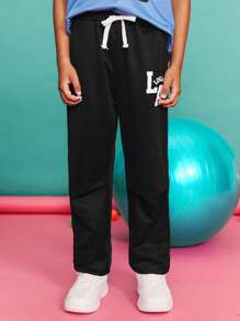 SHEIN Quần nỉ có dây rút in chữ thoải mái, tối giản, cạp vừa dành cho bé trai tuổi teen - màu đen - Xem 1