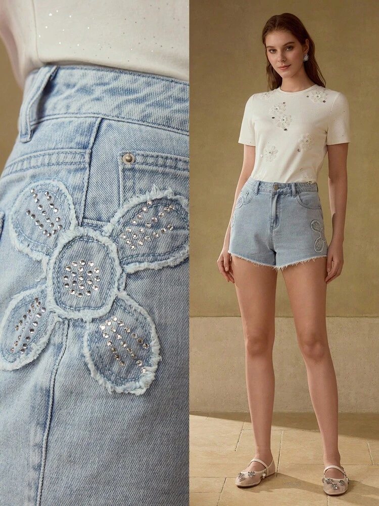 RHINESTONE FLORAL RAW EDGE DENIM SHORTS