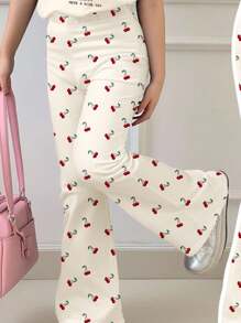 SHEIN Leap Crew 2 piezas Set de camiseta de manga corta holgada de cuello redondo con estampado de cereza vintage blanco y niña preadolescente, y pantalones acampanados ajustados, adecuado para todas las estaciones - Outfits de verano para comodidad fácil, capas de otoño para niños, niños estilosos, uso casual, ropa gráfica para niñas, vuelta al colegio, prendas de Otoño, regreso a casa