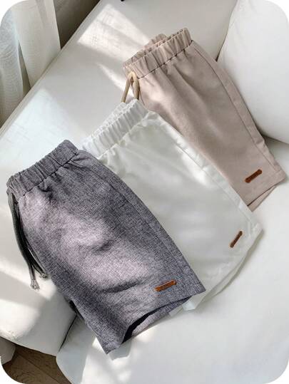 SHEIN 3 piezas/set Joven niño Shorts casuales al estilo universitario de unicolor con cintura elástica y cordón decorativo
