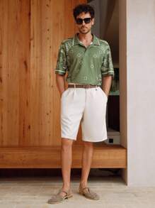 Manfinity BRENVOR Camisa polo casual holgada de manga corta con estampado floral para hombre