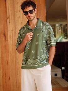 Manfinity BRENVOR Camisa polo casual holgada de manga corta con estampado floral para hombre