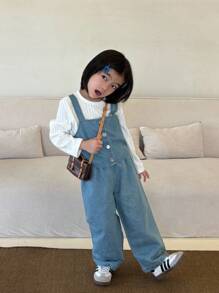 SHEIN Bộ 3 món cho bé gái mùa thu, gồm áo cổ tròn tay dài đơn giản, áo tank top dây đeo kiểu cao bồi thời trang và quần cao bồi may thủ công, thích hợp mặc hàng ngày như đi chơi và nghỉ mát mùa xuân và mùa thu. - Nhiều màu - Xem 8